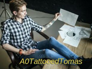A0TattooedTomas